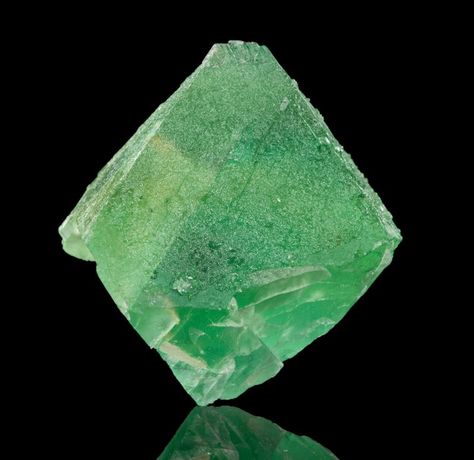 William Wise Mine, Westmoreland, Cheshire Co., New Hampshire 4.7 x 4.5 x 4.2 cm Classic Wise Mine green color on this shapely textbook, translucent fluorite octahedron with frosted faces. Wise Mine fluorites have a bright glowing green color that is seldom matched in fluorites from anywhere else. The upper half of this 360-degree octo is pristine. The lower half is contacted on all four sides, but this remains a colorful, highly representative fluorite from the locale. Purple fluorescence. Colored Contacts, Green Gems, Bright Green, Crystals Minerals, New Hampshire, Rocks And Minerals, Geology, Textures Patterns, Green Colors