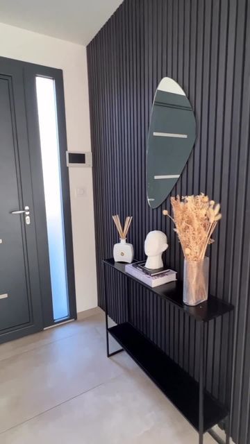 WoodUpp_com on Instagram: "Your entrance is one of the first things your guests see when they visit you - and the first impression is also important. By installing Akupanels in your entrance hall, your guests will be greeted by a huge WOW factor 🤩⁠ Thank you for sharing @jennifer__jmb⁠ ⁠ Color: Black Ash.⁠ ⁠ #acousticpanels#mywoodupp#woodupp#akupanel #woodwall#woodwallart#woodwalls" Entrance Hall Wall Ideas, Black Slats On Wall, Black Entrance Hall, Entrance Panelling Design, Entrance Wall, Wall Pannel Ideas Entrance, Hall Ways Ideas Entrance, Wood Slat Wall Entryway, Hall Ways Ideas