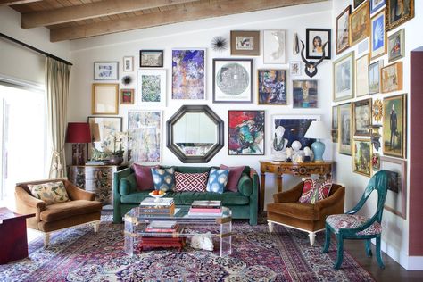 Colorful art and accents fill the great room, where the original ceiling was left intact and unfinished | archdigest.com Color Apartment, Living Room Decor Artwork, Ranch Living Room, Brentwood Los Angeles, Maximalist Room, Pet Wall Art, Colourful Decor, Grid Collage, Ranch Living