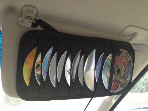 great for road trips....old CD car visor for  kids DVD's :) Cds In Car, Car Cd Holder, 2000s Car Aesthetic, Cd Holder, Car Things, Old Cd, Midwest Emo, Car Deco, Car Visor