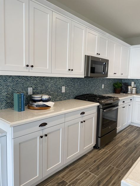 White Kitchen, Dark Floor, Turquoise Backsplash, White Quartz Countertop Coastal Kitchen Design, Diy Bunk Bed, Dark Floors, White Quartz Countertop, Coastal Kitchen, White Countertops, Kitchen Room Design, White Cabinets, Quartz Countertops