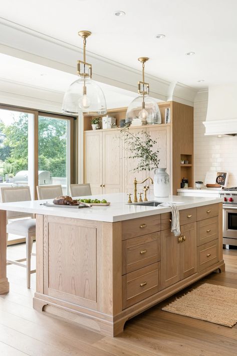 Stylish Neutral Kitchen Ideas for 2024 Coastal European Aesthetic, White Kitchen With Oak Island, White Kitchen Cabinets With Wood Island, Kitchen Island Sink Ideas, White Oak Island Kitchen, Kitchen With Sink In Island, Wood Island White Cabinets, Kitchen Island Sinks, White Kitchen Island Ideas