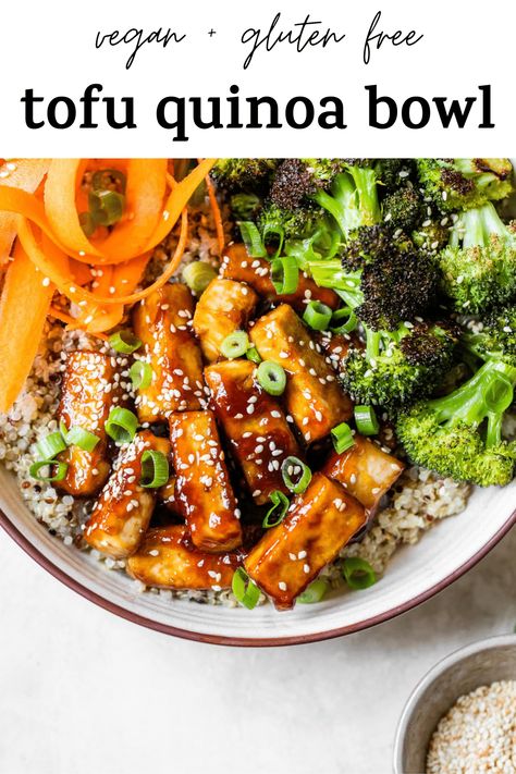 TOFU QUINOA BOWL is the ultimate meatless dinner recipe! It's both vegan   gluten free, and filled with quinoa, broccoli, carrots, and the most delicious fried tofu that's coated in a sesame-soy sauce marinade #quinoabowl #tofu #tofuquinoabowl #vegan