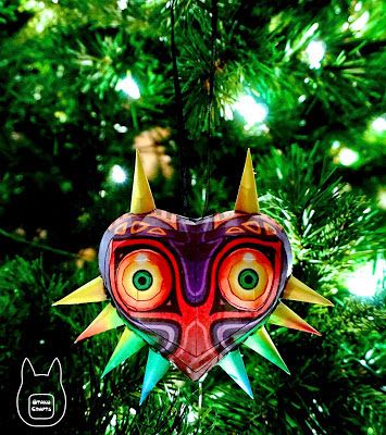 The Legend of Zelda : Majora's Mask Papercraft Ornament | Paperized Crafts Zelda Ornament, Make Your Own Pokemon, Paperized Crafts, Mask Papercraft, Nerdy Christmas, Legend Of Zelda Majora's Mask, Silhouette Ornaments, Geeky Craft, Music Ornaments