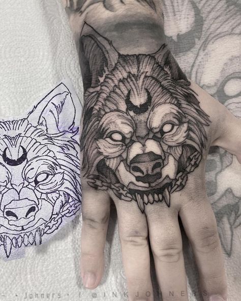 Black and White Wolf Tattoo Black And White Wolf Tattoo, White Wolf Tattoo, Black And White Wolf, Tattoo Hand, Wolf Tattoo Design, Tattoo Design Ideas, Sharp Teeth, Wolf Tattoos, Wolf Tattoo