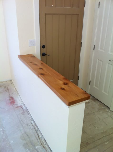 Pony wall with Alaskan Cedar cap, separates entry from living room in small Santa cruz house, cedar finished with lacquer and steel wool sand- made by Kevin White Pony Wall Ideas Room Dividers, Pony Wall Ideas, Half Wall Decor, Half Wall Room Divider, Pony Walls, Half Wall Ideas, Wall Room Divider, Knee Wall, Pony Wall