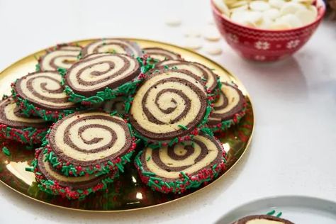 Get Festive Swirl Cookies Recipe from Food Network Swirled Sugar Cookies, Festive Swirl Cookies, Cookies Swirl C, Nutella Swirl Cookies, 2025 Cookies, Christmas Pinwheels, Swirl Sugar Cookies, Melted Candy, Swirl Cookies