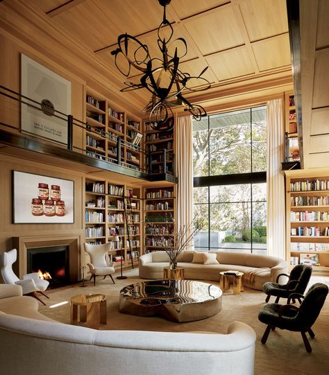 In the double-height library of Eugenio López’s Mexico City house, designer Luis Bustamante installed a sculptural Hervé Van der Straeten light fixture. - photo: Ricardo Labougle Era Victoria, London Residence, Home Library Design, Home Libraries, Interior Design Magazine, Library Design, City House, Home Library, A Living Room