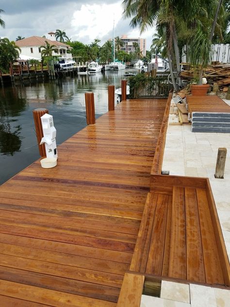 Sealed & stained boat deck & deck on canal Canal Backyard Ideas, Florida Dock Ideas, Backyard Canal Landscaping, Florida Canal Backyard, Boat Deck Ideas, Lakehouse Deck, Mediterranean Beach House, Beach House Backyard, Deck Upgrade