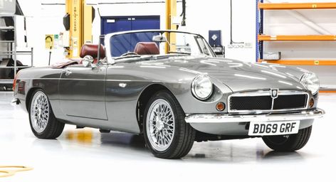 RBW's EV Roadster Is An Electric MGB That's Set To Go Into Production Next Year | Carscoops Mgb Roadster, Lamborghini Aventador Roadster, Mg Cars, British Sports, British Sports Cars, Bmw M2, Cool Sports Cars, Classic Sports Cars, Benz E