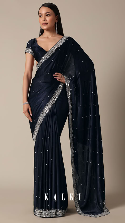 "Indulge in sophistication with this Royal Blue Satin Chinnon Saree. The stones delicately embellish the fabric, creating a luxurious and timeless appeal. The deep blue and navy tones enhance the richness of the saree, making it a perfect choice for party wear. Meticulous detailing and the inclusion of unstitched blouse fabric ensure a personalized fit.
" Blue Velvet Saree, Chinnon Saree, Royal Blue Saree, Nykaa Fashion, Yumna Zaidi, Kalki Fashion, Blue Saree, Blue Satin, Blouse Fabric