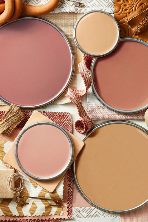 Ruddy pinks and light camel tones borrow inspiration from the warm, earthy landscapes of the Southwest. Layering variations of terra-cotta (such as pastel, clay, and rust) creates a calming, cozy look that's perfect for bedrooms. #colorpalettes #pinkcolorschemes #coralcolorschemes #paintcolorideas #bhg Benjamin Moore Paint Colors Terra Cotta, Clay And Pink Bedroom, Meditation Room Wall Color, Terra Cotta Home Decor, Boho Bedroom Wall Colors, Clay Living Room, Living Room Warm Colors, Terra Cotta Bedroom, Rust Bedroom