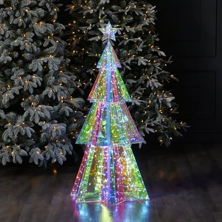 Illuminate your holiday celebrations with our Prismatic Iridescent Christmas Tree crafted by Seasonal LLC. Standing at 45 inches tall and adorned with 320 LED lights, this enchanting tree casts a radiant glow whether displayed indoors or outdoors. Elevate your festive decor with this dazzling centerpiece, designed to enchant and delight throughout the holiday season. Color: Multicolor. Iridescent Christmas Tree, Christmas Led Lights, Iridescent Christmas, White Artificial Christmas Tree, Christmas Tree Clear Lights, Christmas Lighting, Christmas Tree Crafts, Holiday Christmas Tree, Holiday Store