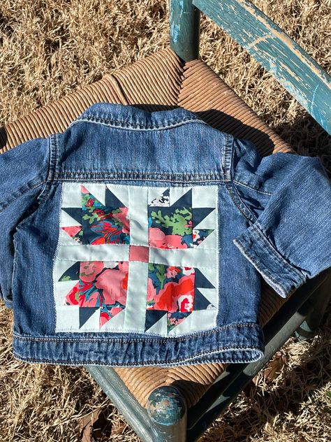 This is a Upcycled (meaning: I get these Jean jackets  from thrift stores, wash and make sure there is no damage and then upcycle them by adding vintage sheets or quilt blocks to them) toddler Jean jacket with boho/floral vibes. Back has quilted floral block that has been attached for a nice vintage look.  Jacket is taken and sewed and quilted by me in my home studio.  Brand: Baby Gap Size: 18-24 months. Jean Jacket With Quilt Block, Quilt Jean Jacket, Quilted Jean Jacket, Repurposed Quilts Ideas, Upcycled Jean Jacket, Paint Jean Jacket, Denim Jacket Embroidery Ideas, Diy Jean Jacket Ideas, Jean Jacket Embroidery