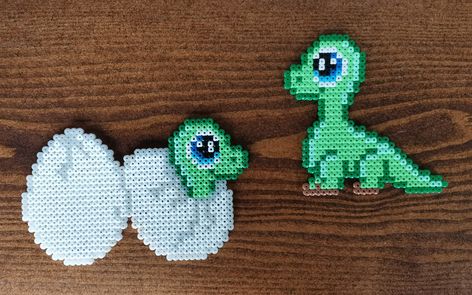 Pattern by @anjatakacs Pearler Bead Patterns Dinosaur, Dino Perler Bead Pattern, Mini Fuse Beads Ideas, Perler Dinosaur, Dino Perler Beads, Perler Bead Dinosaur, Dinosaur Perler Bead Pattern, Dinosaur Perler Beads, Pixel Art Dinosaur