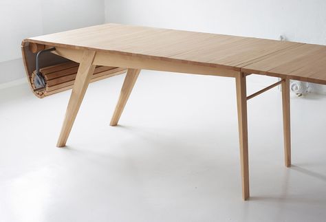 A Wood Table You Can Roll Up! | Yanko Design Expandable Table, Folding Furniture, Unique Tables, Design Del Prodotto, Yanko Design, Space Saving Furniture, Design Week, Solid Wood Furniture, Wood Table