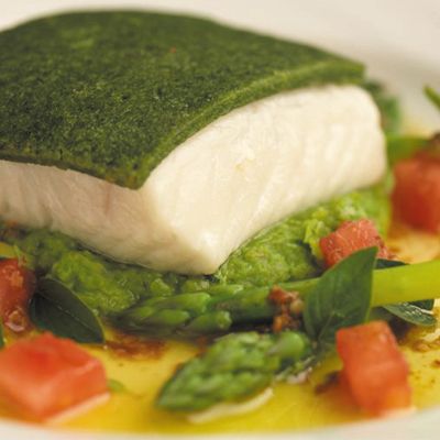 Halibut Recipe - Herb-Crusted Halibut with Pea Puree and Coriander Vinaigrette - Delish.com Coriander Vinaigrette, Crusted Halibut, Gordon Ramsey Recipes, Pea Puree, Canadian Recipes, Gordon Ramsay Recipe, Halibut Recipes, Seafood Entrees, Food Innovation