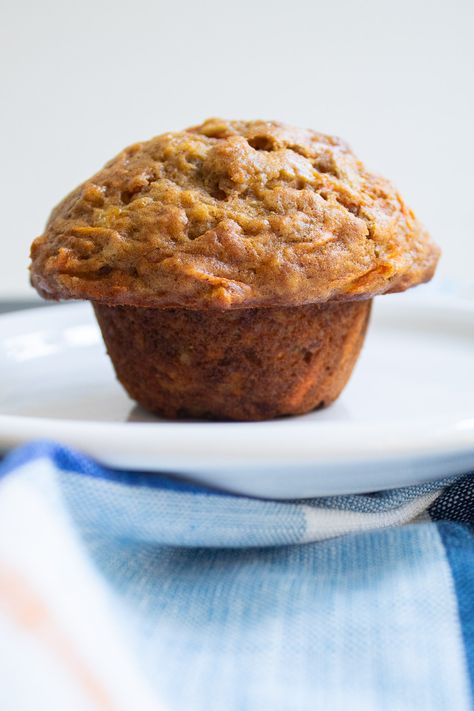 A baked muffin sits alone on a white plate in profile to show the tall rounded muffin top. Carrot Banana Muffins, Bakery Muffin, Banana Carrot Muffins, Bakery Muffins, Cake Varieties, Bakery Style Muffins, Muffin Tops, Carrot Muffins, Best Bakery