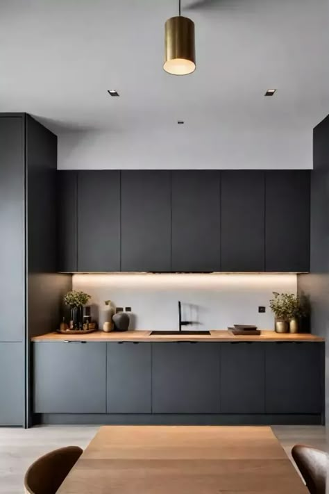 Dark grey kitchen cabinets with brass accents Dark Modern Kitchen Cabinets, Dark Grey Kitchen Cabinets Modern Interior Design, Charcoal Kitchen Cabinets Modern, Grey And Wooden Kitchen, Dark Grey Kitchen Cabinets Modern, Dark Grey Modern Kitchen, Grey Wall Kitchen, Dark Grey Cabinets Kitchen, Dark Grey Kitchen Ideas