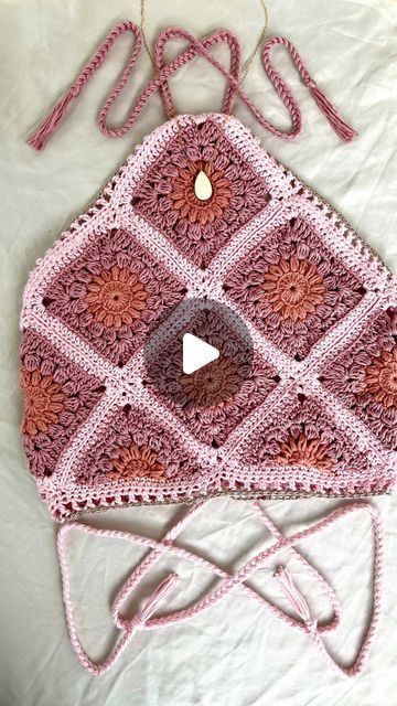 Lizzie on Instagram: "🌸🌺Adding the finishing touches to this variation on the Sunburst Mosaic Bralette🌺🌸
.
I’ve had a few questions lately on this top so I thought I’d give you a run down on the pattern🥰
The pattern is primarily written for the V-neck Bralette version, you can see a picture of it all over my Instagram profile, and the pattern has suggestions for different configurations and stackings of the squares and triangles for different  styles! Last year, my testers all made different variations of the top, and the measurements and photos of these styles are featured in the gallery guide which is downloadable with the original pattern too! 
.
If you have any questions or want to switch it up in any way please feel free to and tag me or send me a pic of whatever variation you ha Triangle Crochet Top, Sunburst Mosaic, Crochet Sunburst, Triangle Crochet, A Pic, The Gallery, Triangles, Different Styles, Bralette