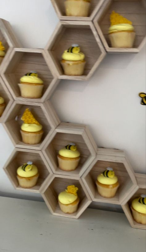 Bee honeycomb homemade cupcake stand Hexagon Cupcake Display, Honeycomb Centerpiece, Honeycomb Display, Honeycomb Cupcake Display, Diy Honeycomb Cupcake Stand, Honeycomb Cupcake Stand, Honey Comb Shelves For Nursery, Honey Comb Cupcake Stand, Bee Themed Cupcakes Shower Ideas