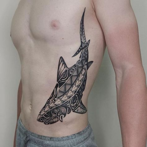 23 Shark Tattoo Ideas and Meanings - 2023 Guide Shark Tattoo Polynesian, Shark Tattoos Men, Geometric Shark Tattoo, Hawaii Tattoo Men, Shark Tattoo Back, Shark Tattoo Men, Tiger Shark Tattoo, Jaws Tattoo, Shark Tattoo Design