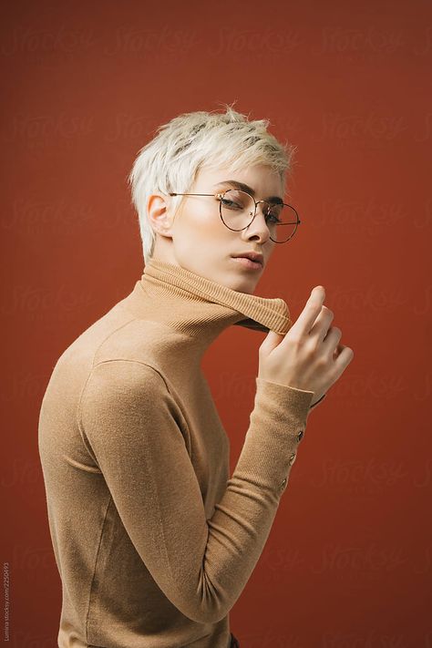 Beautiful short-haired platinum blonde Caucasian woman fashion model posing at studio expanding her turtleneck collar. Male Reference, Fashion Model Poses, Anatomy Study, Beautiful Shorts, Photos Of Women, Platinum Blonde, Model Release, Woman Fashion, Model Poses