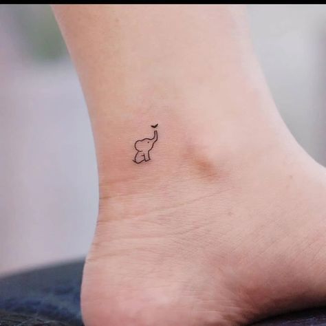 20+ Irresistibly Adorable Mini Elephant Tattoo Inspirations - WomenSew Three Elephant Tattoo, Dainty Elephant Tattoo, Single Line Elephant, Mini Elephant Tattoo, Tattoos Elephant, Elephant Tattoo Ideas, Baby Elephant Tattoo, Tiny Elephant Tattoo, Tattoo Elephant