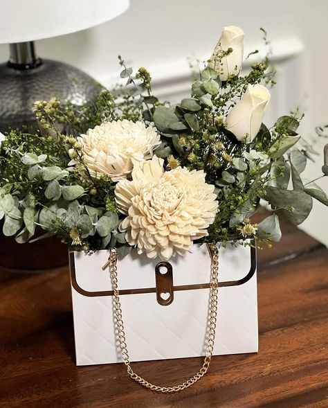 Wooden Flowers and Dried Florals in a cute purse gift box! . . . . . . . . #woodenflowers #driedfloralgifts #driedandpreservedflowers #preservedfloralarrangements #floralarrangement #floralgifts #sustainableliving #sustainablegifts #earthfriendlygifts #mothersdaygifts Dried Florals, Cute Purse, Purse Gift, Wooden Flowers, Sustainable Gifts, Cute Purses, Floral Gifts, Earth Friendly, Floral Arrangement