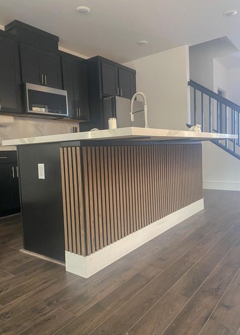 Kitchen Side Wall Ideas, Batton Board Kitchen Island, Wood Slats On Kitchen Island, Slatted Kitchen Island, Wooden Slat Kitchen Island, Kitchen Island Kick Wall Ideas, Island Wrapped In Wood, Slat Wall Kitchen Island, Wood Slat Island Kitchen