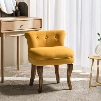 Rounding out your powder room with this modern classic vanity stool finished in a beautiful appearance. This stool is sure to be a must-have piece to brighten you all day long. Perched atop four unique legs designed with subtle curves that bring you endless reverie, this on-hand seating adds a little dash of definition and character to your room, while the button-tufted design on the backrest anchors your place to a sophisticated aesthetic. A sturdy solid and manufactured wood frame with soft fo Tufted Bedroom, Bathroom Chair, Dressing Chair, Gray Vanity, Upholstered Stool, Vanity Chair, Vanity Stool, Modern Vanity, Dressing Table With Stool