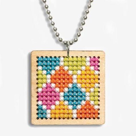 Cross stitch pendants are a big trend right now in the jewelry making business.  If you have been thinking of trying this for yourself, here are 8 ideas to get you started.  While it’s the sa… Stitch Necklace, Cross Stitch Necklace, Jewelry Making Business, Laser Cut Wood Earrings, Stitch Jewelry, Embroidered Necklace, Small Cross Stitch, Necklace Cross, Mini Cross Stitch