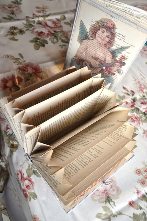 12 Amazing Book Crafts to Try | Mabey She Made It Upcycling Tutorials, Diy Old Books, Old Book Crafts, Penanda Buku, Recycled Books, Book Page Crafts, Altered Book Art, Folded Book Art, Diy Upcycling