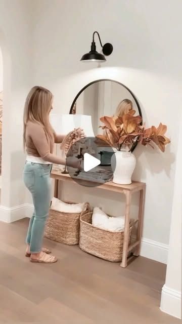 Erin Vogelpohl on Instagram: "Here is my entryway space styled two different ways for Fall! Which is your favorite? 🍂🍁🍂
1) The simple modern farmhouse style console table with round mirror OR 
2) the French country style console table with arched mirror??!! 
( You’ll see I changed up the accessories a bit for the final look of option #2 at the end😉). 

All entryway sources and my outfit are linked here 👉 http://liketk.it/3mdxI on the LTK app as well as on my website, mytexashouse.com. 
👉Like this post and follow @mytexashouse for more decorating tips for Fall!!🍂🍁🍂" Console Table Decorating Living Room, Entryway Shelf Decor, Farmhouse Style Console Table, Table With Round Mirror, Entryway Shelves Decor, French Country Entryway, Simple Modern Farmhouse, Style Console Table, Arched Mirror