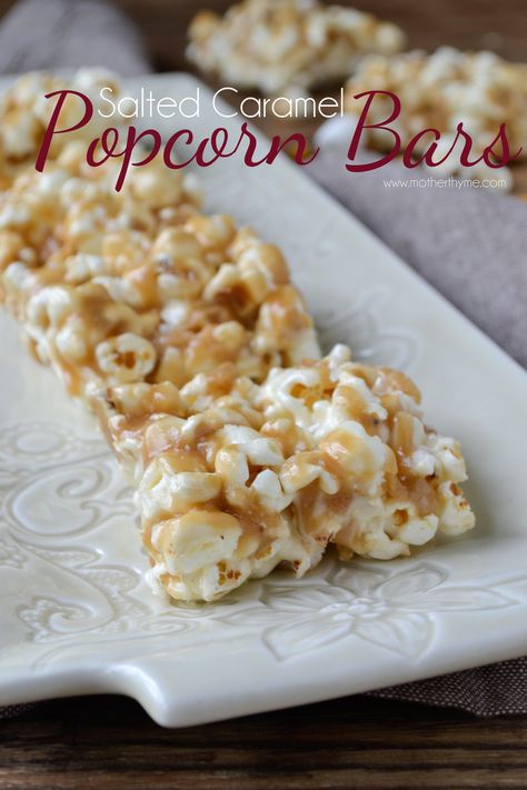 Salted Caramel Popcorn Bars - www.motherthyme.com Popcorn Bar Recipes, Popcorn Marshmallow, Salted Caramel Bars, Peanut Butter Popcorn, Salted Caramel Recipes, Salted Caramel Popcorn, Popcorn Treats, Salty Treats, Marshmallow Treats