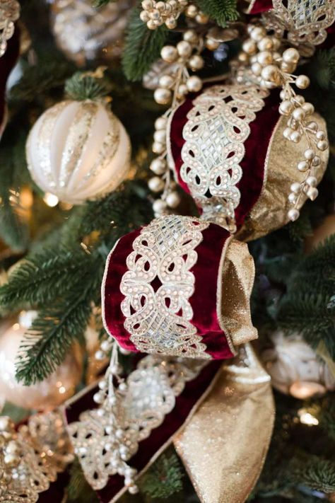 Maroon and gold Christmas ribbon with gold ornaments. Burgundy And Gold Christmas Tree, Burgundy And Gold Christmas, Christmas Tree Inspiration Red And Gold, Gold Christmas Tree Ideas, Burgundy Christmas, Christmas Tree Picks, Red And Gold Christmas Tree, Gold Christmas Tree Decorations, Gold Christmas Ornaments