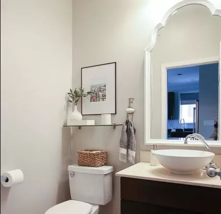 15 Over the Toilet Storage Ideas That Actually Look Amazing Over Toilet Artwork, Bathroom Shelf Ideas Above Toilet Modern, One Shelf Over Toilet, Bathroom Wall Art Above Toilet, Glass Shelves Over Toilet, Picture Behind Toilet, Bathroom With Shelves Above Toilet, Decorate Over Toilet, Above Toilet Decor Minimalist