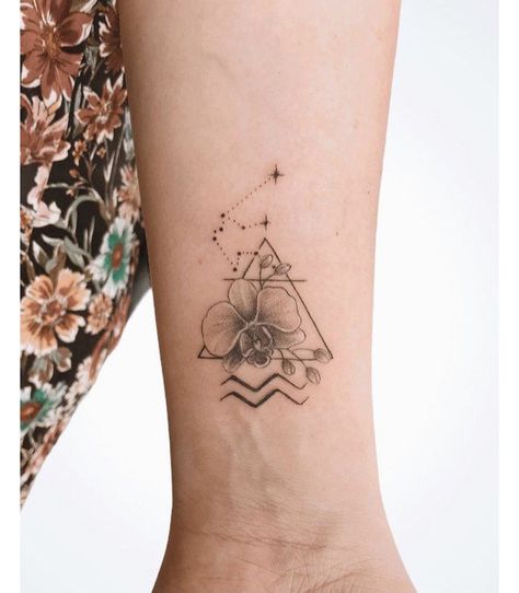 Aquarius Lotus Tattoo, Aquarius Tattoo Constellation Orchid, Aquarius Planet Tattoo, Aquarius Glyph Tattoo, Aquarius Sign Tattoo Symbols, Aquarius Tattoo Flower, Aquarius Back Tattoo, Dainty Aquarius Tattoo, Aquarius Tattoo Orchid