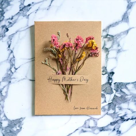 💐NEW💐 Celebrate the extraordinary mother in your life who brightens your world with our beautiful Mother's Day cards. This uniquely crafted card has the timeless beauty of dried flowers, creating a perfect keepsake for the most important motherly figure in your life. Perfect for framing or displaying, this card is more than just a token of appreciation. It doubles as a thoughtful gift that your mum can cherish for years to come, serving as a constant reminder of the love you share. #mother... Dried Flowers Card, Dried Flower Cards, Flowers Card, Mother's Day Cards, Mother's Day Card, Mothers Day Cards, Personalized Card, Beautiful Blooms, Flower Cards