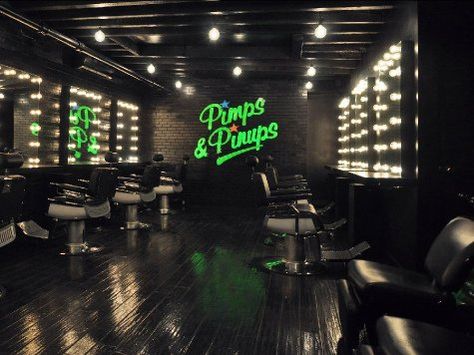 The dark and cool design of the New York outpost of the east London hair salon Pimps & Pinups. Looks at the nice bright green logo design, which they carry over to their own brand products as well.  #pimps&pinups #newyork #shoreditch #london #salonideas #saloninteriors http://belliatasalonsoftware.com Glam Hair Salon, Hollywood Glam Hair, Interior Design Philippines, Hair Salon Interior Design, Salon Interior Design Ideas, Barber Shop Interior, Interior Design Color Schemes, Nail Salon Interior Design, Beauty Salon Interior Design