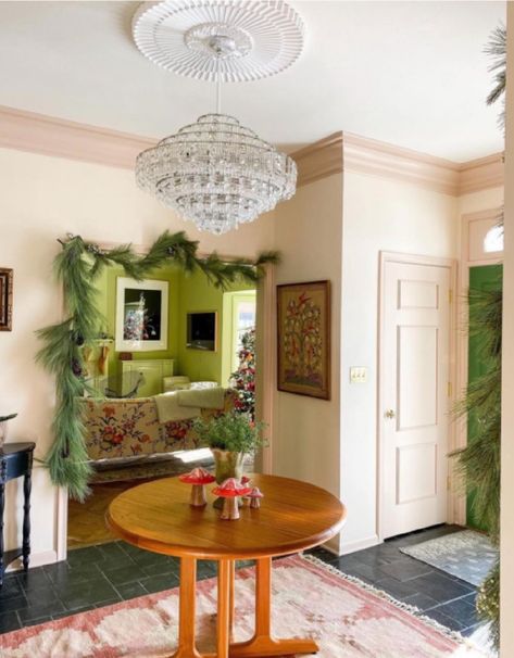 A glorious pink foyer with a magnificent crystal chandelier is decorated for the holidays - @witanddelight. #pinkrooms #classicinteriors #palepink Subtle Pink Paint, Pink Foyer, Blush Pink Paint, Pink Interiors, Pink Paint Colors, Favorite Paint Colors, Gorgeous Interiors, Interior Design Photos, Girl’s Room