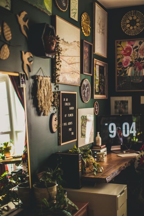 Bohemian Jungle Office Inspiration | vaughan-house.com Cluttercore Office, Jungle Theme Bathroom Ideas Master Bedrooms, Hipster Office Decor, Dark Wall Aesthetic Bedroom, Slytherin Living Room Ideas, Cozy Art Room Ideas, Hiker Home Decor, Green Room With Gold Accents, Bohemian Witch Decor