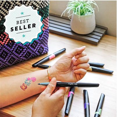 These ideas are sure to impress! - Good Housekeeping Tattoo Markers, Teen Easter Basket, Exploding Kittens Card Game, Tattoo Maker, Stocking Stuffers For Teens, Free Stencils, Popular Toys, Fake Tattoos, Good Housekeeping