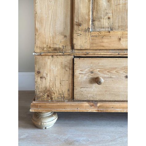 A stunning antique English Pine Armoire/Hutch featuring amble storage with interior shelves. The patina and wood tone on this piece cannot be beat. An enclosed upper section with the original hardware and key sit on a lower drawer with double knobs and keyhole resting on bun feet.    Approximate Dimensions:  height: 73.75"  width: 48" at top trim / 44" at body  depth: 19" Pine Armoire, Antique Pine Furniture, Antique Hutch, Antique Armoire, Interior Shelves, Pine Furniture, Vintage Wardrobe, Hutch, French Antiques