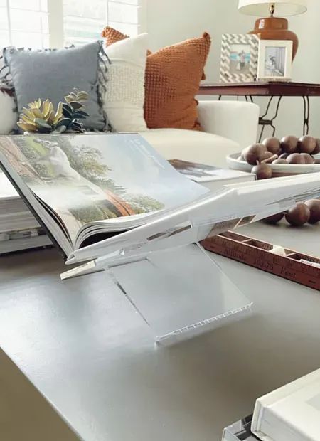 This acrylic book stand makes a fun addition to a coffee table or console table! :clap_tone1: #coffeetable #coffeetabledecor #coffeetablestyling #amazonhome #amazonfinds #LTKhome Nyc Room, Nyc Rooms, Acrylic Coffee Table, Casual Decor, Book Holder, Book Stand, Coffee Table Styling, Coffee Table Book, California Casual