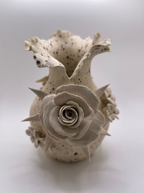 Introducing the Perfect Original Ceramic Sculpture for Your Home Décor: The Garden Vessel! This Garden Vessel features meticulously handcrafted Forever Roses and posies. A labor of love, each delicate petal is expertly sculpted, creating a lifelike masterpiece that will elevate the look of your home décor and become an heirloom piece for generations to come. It weighs 1 pound and is approximately 5 x 4 inches wide and 6 inches tall. The Garden Vessel is also a unique and thoughtful present ideal Forever Roses, Flower Sculpture, Ceramics Pottery Vase, Sculpture Ceramic, Mixed Media Art Canvas, Flower Sculptures, Decorations Table, Forever Rose, Ceramic Flower Pots