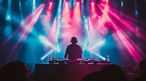 StockCake A silhouette of a DJ performing at a live concert amidst vibrant lights and music fans. Dj Performance, Dj Stand, Concert Lights, Dj Stage, Dj Set, Dj Music, Dubstep, Music Fans, Music Room