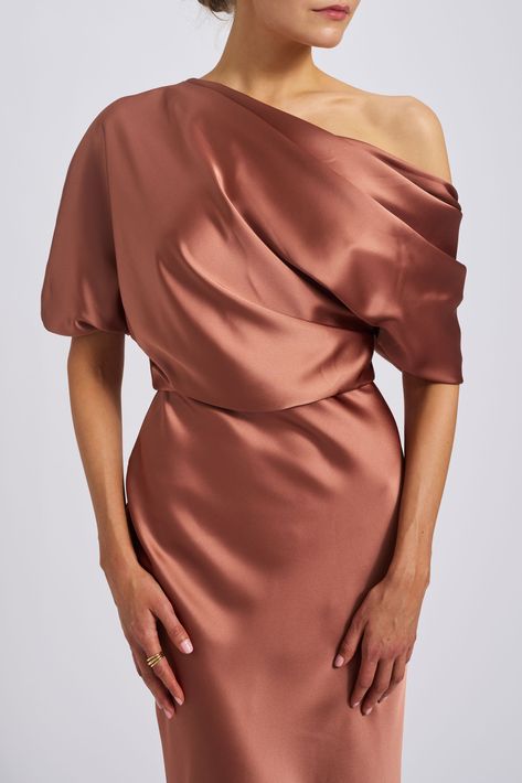 The Slouch Dress - Fluid Satin off-one-shoulder draped bodice gown with bias column skirt. Shown in Sienna, Champagne, Navy, Jade and Truffle. It is possible to have this style Made-to-Order in any of our standard Fluid Satin colors, please reach out to customerservice@amsale.com to place an order. Luxury Asymmetrical Bias Cut Satin Dress, Pre-draped Silk Evening Dress With Asymmetrical Neckline, Luxury Satin Bias-cut Evening Dress, Luxury Off-shoulder Maxi Dress With Draped Sleeves, Luxury Asymmetrical Bias-cut Satin Dress, Peplum Gown, Amsale Dress, Cape Gown, Column Skirt