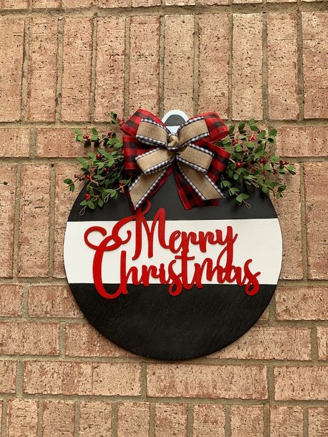 Merry Christmas Home Sign, Buffalo Plaid Front Door Decor, Round Door Decoration, Front Door Wreath, Door Hanger, Home Door Hanger 18x18 wood round door hanger, 1/2 inch thick. There is a hanger on back Made from wood. Greetings! Decorate your space with This Merry Christmas Wood Front door Decor! Charger Plate Crafts, Wooden Rounds, Home Door Hanger, Cricut Christmas Ideas, Wreath Door Hanger, Front Door Christmas Decorations, Circle Crafts, Door Signs Diy, Laser Projects