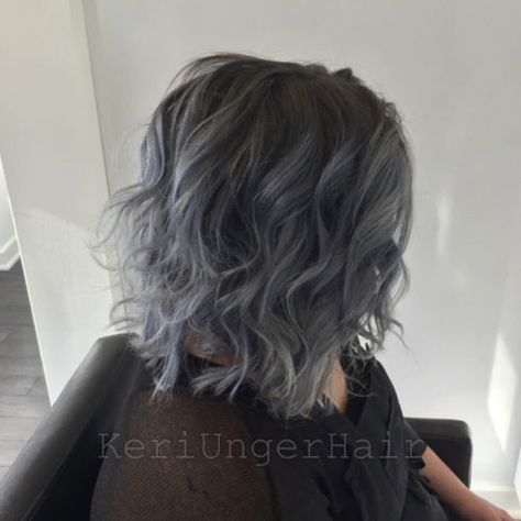 One of the most prominent trends of 2015 so far is intentionally grey hair. From silver to steel, grey hair color is the perfect color for clients wishing for a little more edge. Colorist Keri Owsiak recently helped transform her guest from faded, grown-out lavender to a gorgeous, gunmetal grey. Below, she shares tips on recreating the look. Steel Grey Hair, Grey Balayage, Black And Grey Hair, Gray Balayage, Silver Grey Hair, Hair Color Pastel, Gray Hair Highlights, Hair Idea, Hair Color Blue